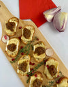 Brie cheese croutons with caramelized onion compote (x12)