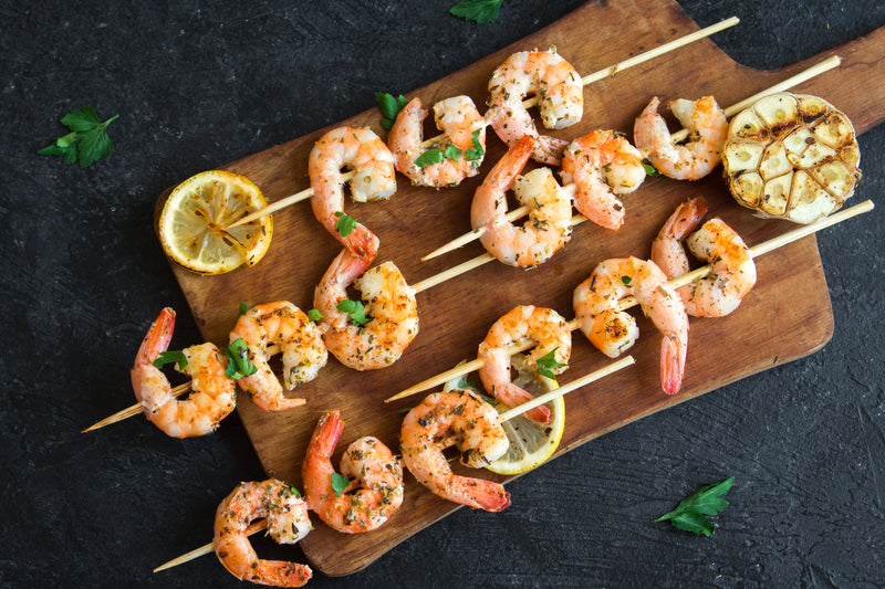 Grilled shrimp skewers served with chimichurri sauce (x12)